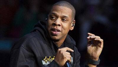 Jay-Z stops show to hug cancer survivor