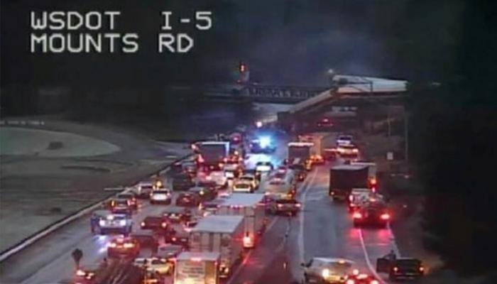 Train derails onto highway in Washington state, multiple killed