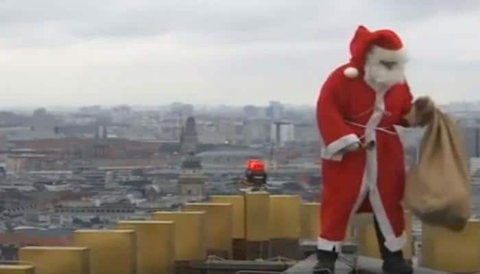 Watch: Santa Claus is now climbing skyscrapers to reach you with gifts