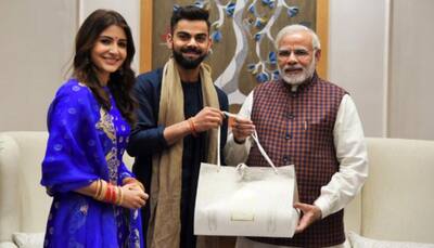 Virat Kohli, Anushka Sharma invite PM Narendra Modi for Delhi reception—Pics