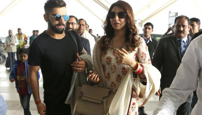 Virat Kohli-Anushka Sharma clicked at Mumbai airport amid huge cheers!Watch videos