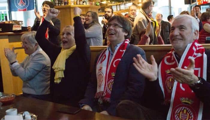 Carles Puigdemont mulls whether to return to Catalonia after win