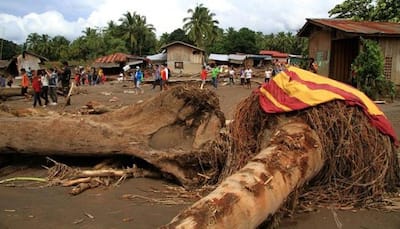 Rescuers search for Philippine storm victims as toll rises to 200