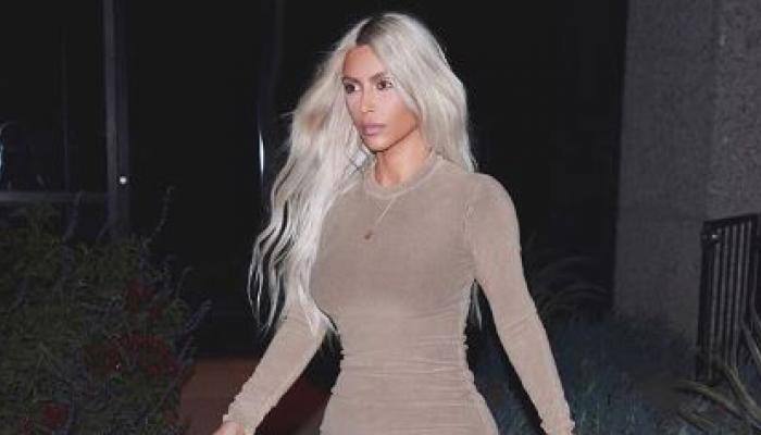 Kim Kardashian tries out ice-skating with children