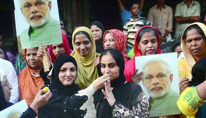 Muslim women exchange sweets, celebrate &#039;Eid&#039; as triple talaq bill gets tabled in Parliament