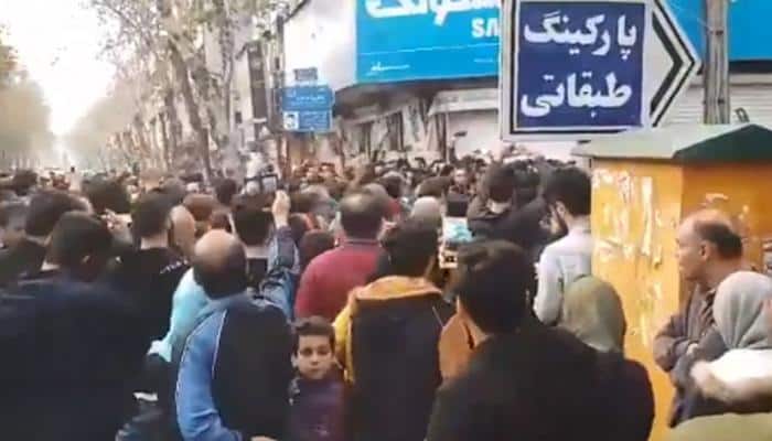 Protests hit Iran as government warns against `illegal gatherings`