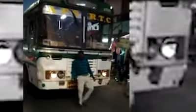 WATCH: Drunken man tries to stop bus in Andhra's Kurnool