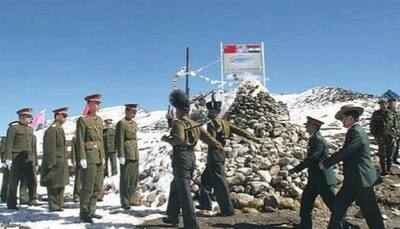 Chinese troops crossed into Indian territory with road construction equipment, stopped by Indian Army