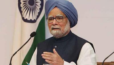 Happy you stand vindicated in 2G case: Manmohan Singh to A Raja