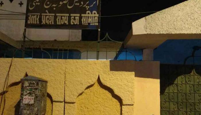 Day after being coloured orange, Haj House repainted to original green-white colour