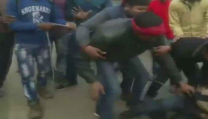 Men thrashed by mob in UP&#039;s Mughalsarai after caught sealing cows