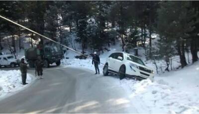 Indian Army rescues tourists after private car slips off snow-covered J&K road