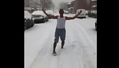 Viral video: Man grooves to 'Aa Jao Meri Tamanna' song in the snow wearing vest and shorts