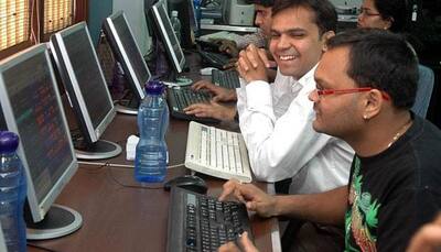 Sensex surges 300 points, closes above 35,000-mark for first time