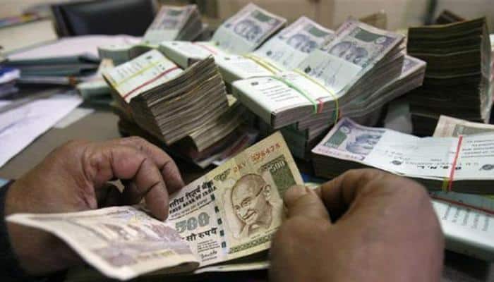 Police probe bank employees&#039; role in converting Rs 97 crore demonetised currency