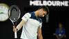 Australian Open: Struggling Novak Djokovic out but Roger Federer into quarters