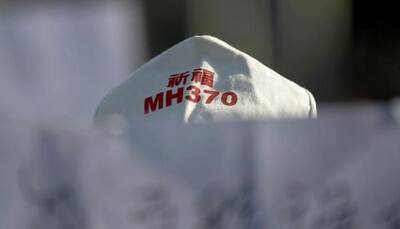 Malaysia says search resumes for missing flight MH370