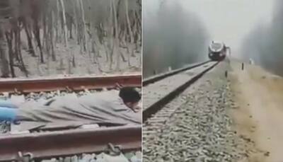 Watch: Kashmiri man attempts life-threatening rail stunt, Twitter calls it stupidity