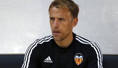 New England women's football coach Phil Neville in 'sexist' tweet row