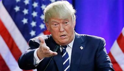 At Davos summit, delegates talk down Donald Trump but bet big on US