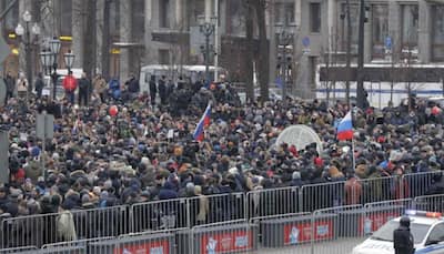 Opposition leader Alexei Navalny arrested as thousands rally against Vladimir Putin and 'pseudo-polls'