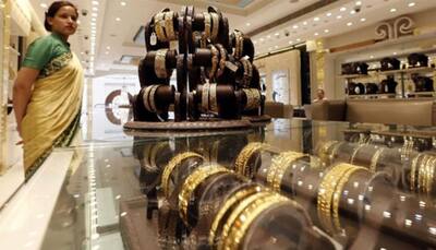 Gold surges on firm global cues, jewellers' buying