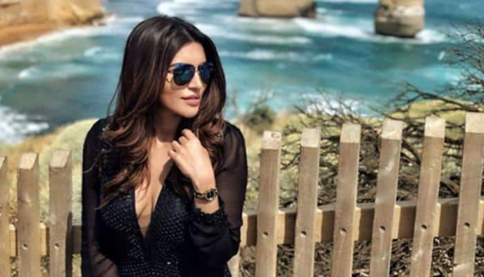 Shama Sikander meditates for &#039;peace&#039; but it&#039;s her red bikini which grabs attention