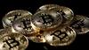 Bitcoin slides below $6,000; half its value lost in 2018