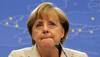 Merkel under fire from own ranks over German coalition deal