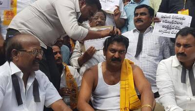 Miffed over budget allocation for Andhra, TDP MLA Bode Prasad gets head tonsured