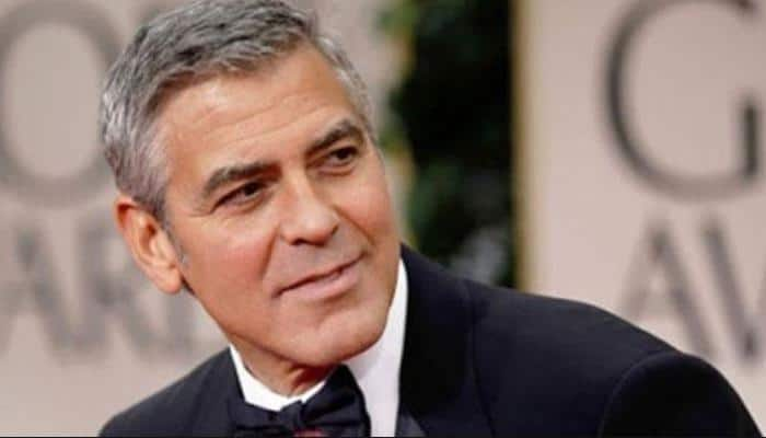 I would absolutely trade my life&#039; for wife Amal: George Clooney 