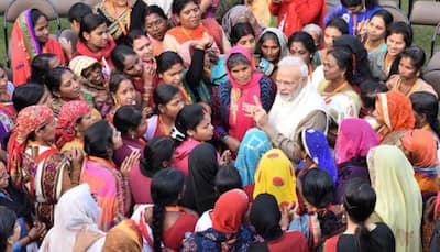 PM Modi meets over 100 beneficiaries of LPG scheme for poor families - See Pics