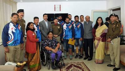 Sport Minister Rajyavardhan Singh Rathore congratulates Indian para-cycling contingent