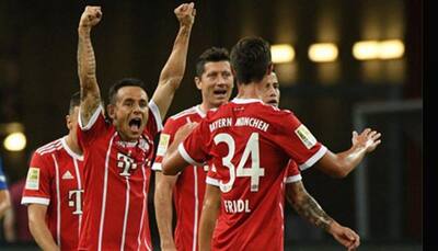 Thomas Mueller, Robert Lewandowski doubles power Bayern Munich to complete rout of 10-man Besiktas in Champions League