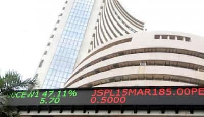 Equity indices close higher, Sensex rises over 300 points
