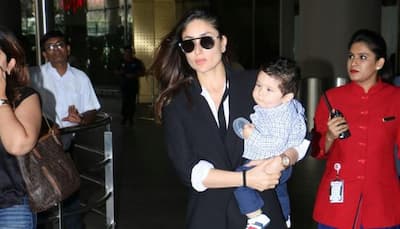 Taimur Ali Khan wants mommy Kareena to hold him in her arms— See pics