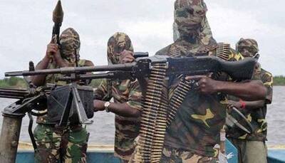Nigeria sets up probe into girls' school attack, abductions