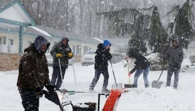 Storm brings wind, flooding and snow to US Northeast