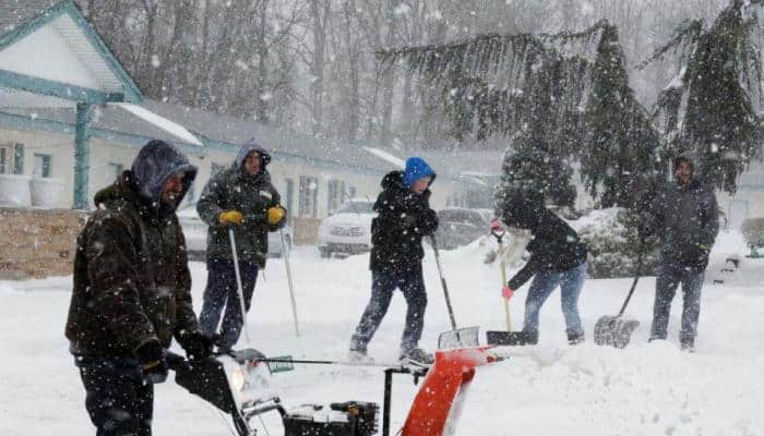 US Northeast still facing flooding, outages after killer storm