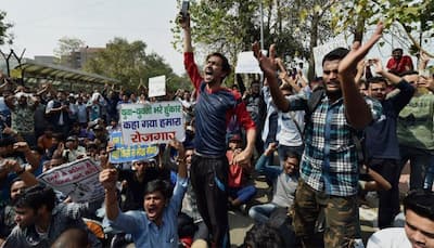 SSC aspirants go bald to protest against exam paper leak in Delhi