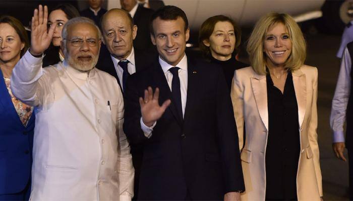 French President arrives in India on four-day visit; PM Narendra Modi receives Emmanuel Macron at airport