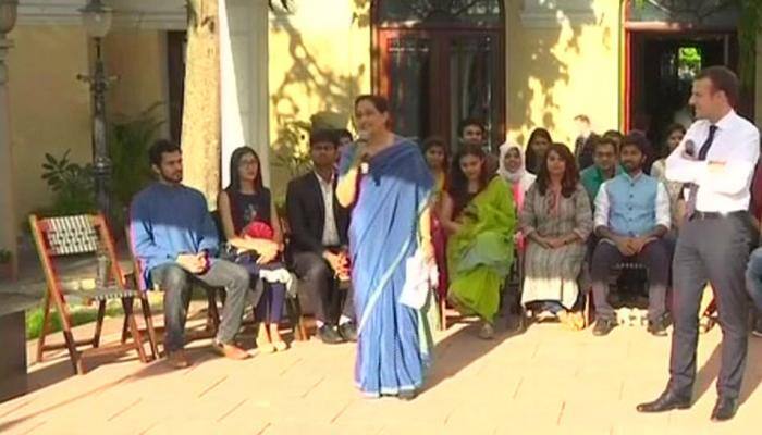 President Emmanuel Macron interacts with students in Delhi, invites them to come to France