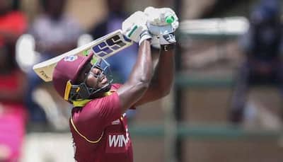 Rovman Powell maiden ton lifts West Indies to overcome Ireland, make Super Six stage 