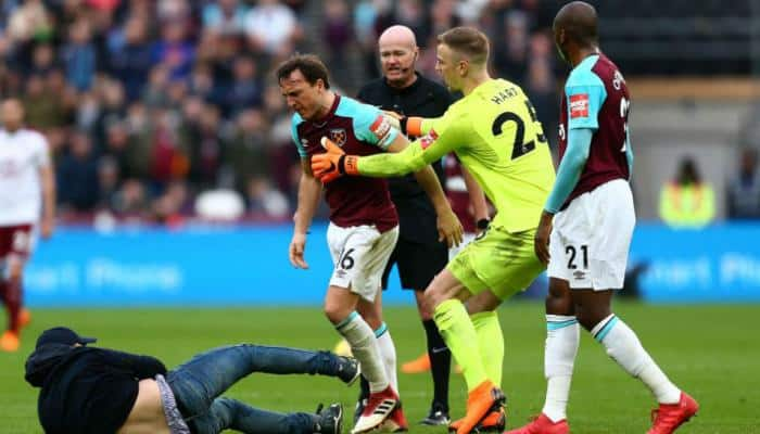 Premier League: West Ham United fans invade pitch, force team owners to flee seats