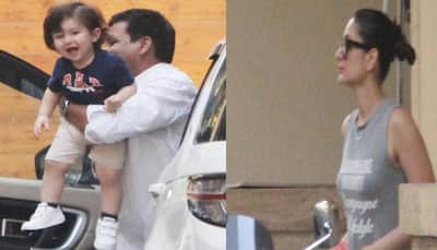 Taimur Ali Khan looks like the happiest baby in town while mommy Kareena looks away in style-Pics