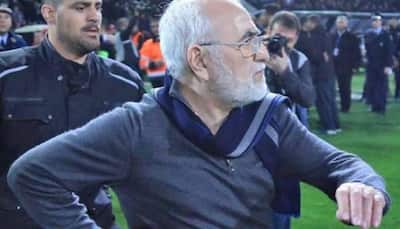 Greek football club president Ivan Savvidis apologises after gun incident