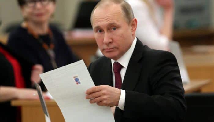 Vladimir Putin eyes fourth term in polls as opposition cries foul
