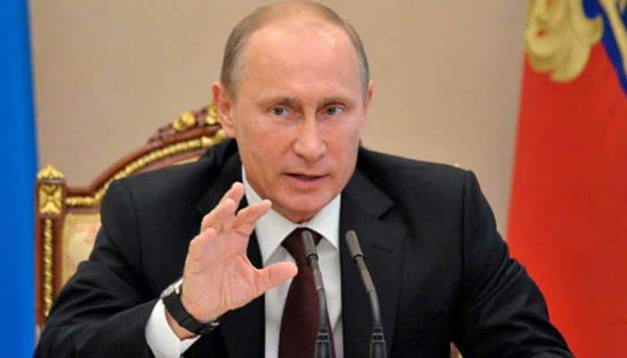 Vladimir Putin cruises to landslide election victory, thanks supporters