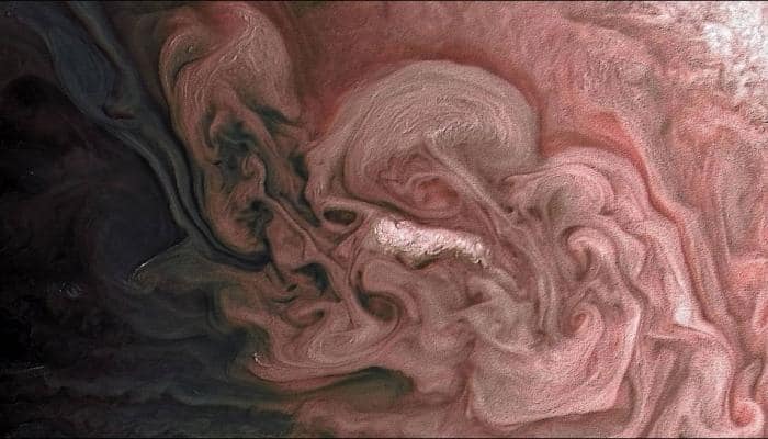 Flying across Jupiter&#039;s clouds, NASA&#039;s Juno gets close to a &#039;rosy&#039; storm – See pic