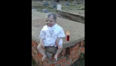 Watch: Creepy doll found in cemetery follows the camera with its eyes